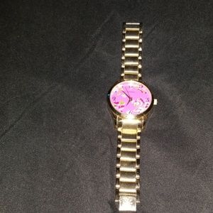 Isaac Mizrahi gold tone link watch w/floral face